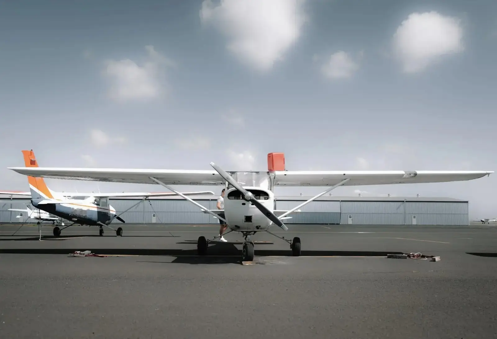 Cessna light aircraft parked on the apron